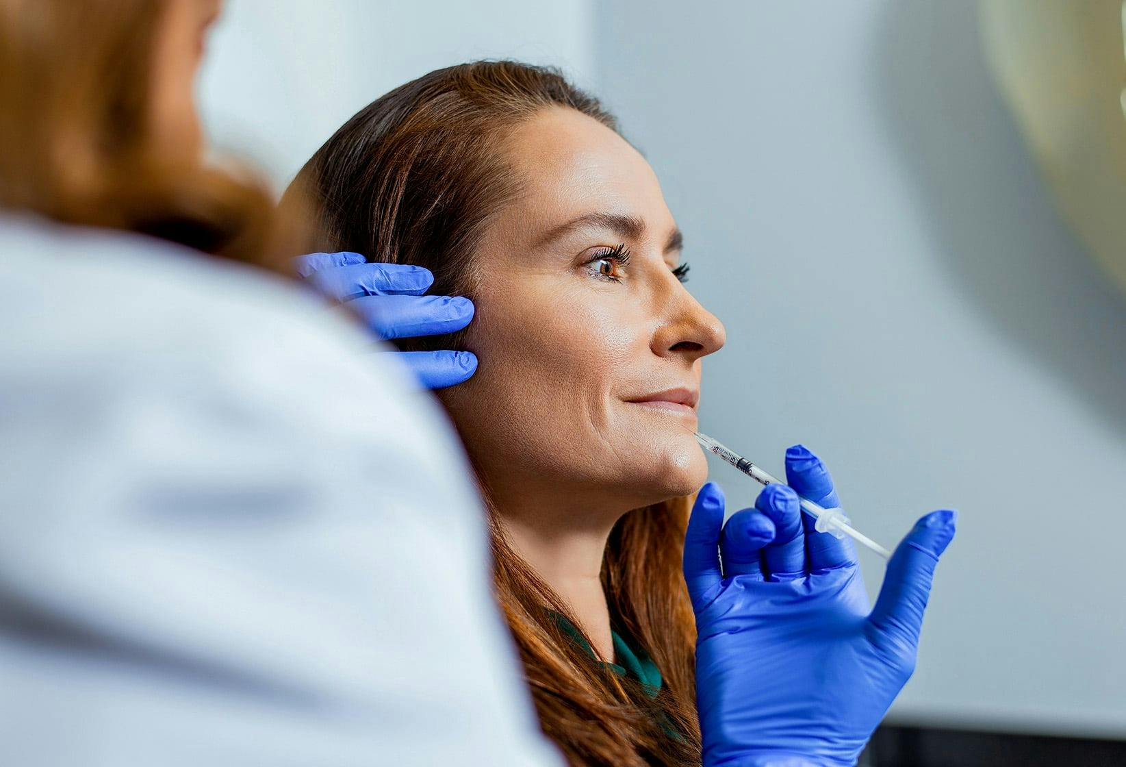Patient receiving facial injections