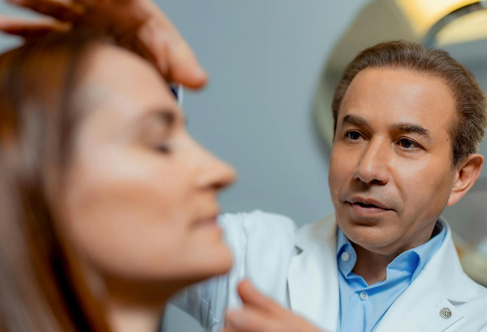 Doctor inspecting patient