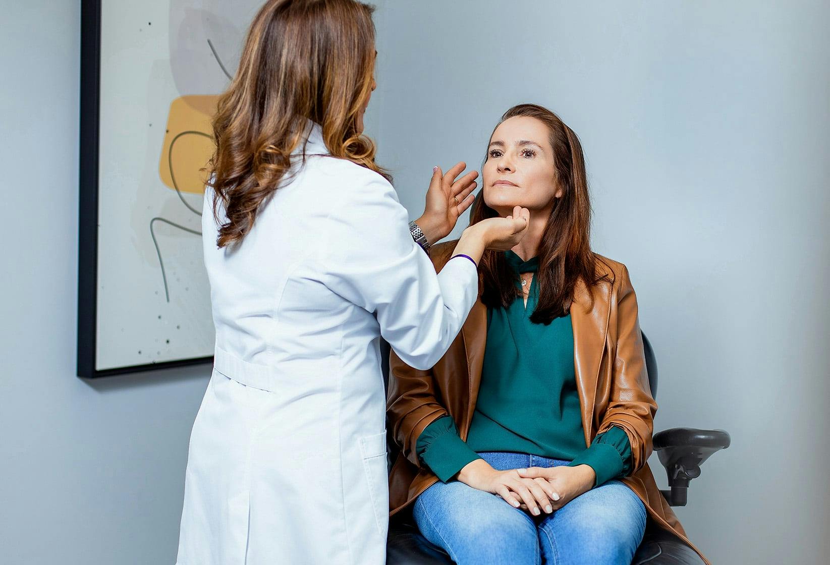 Doctor inspecting patient
