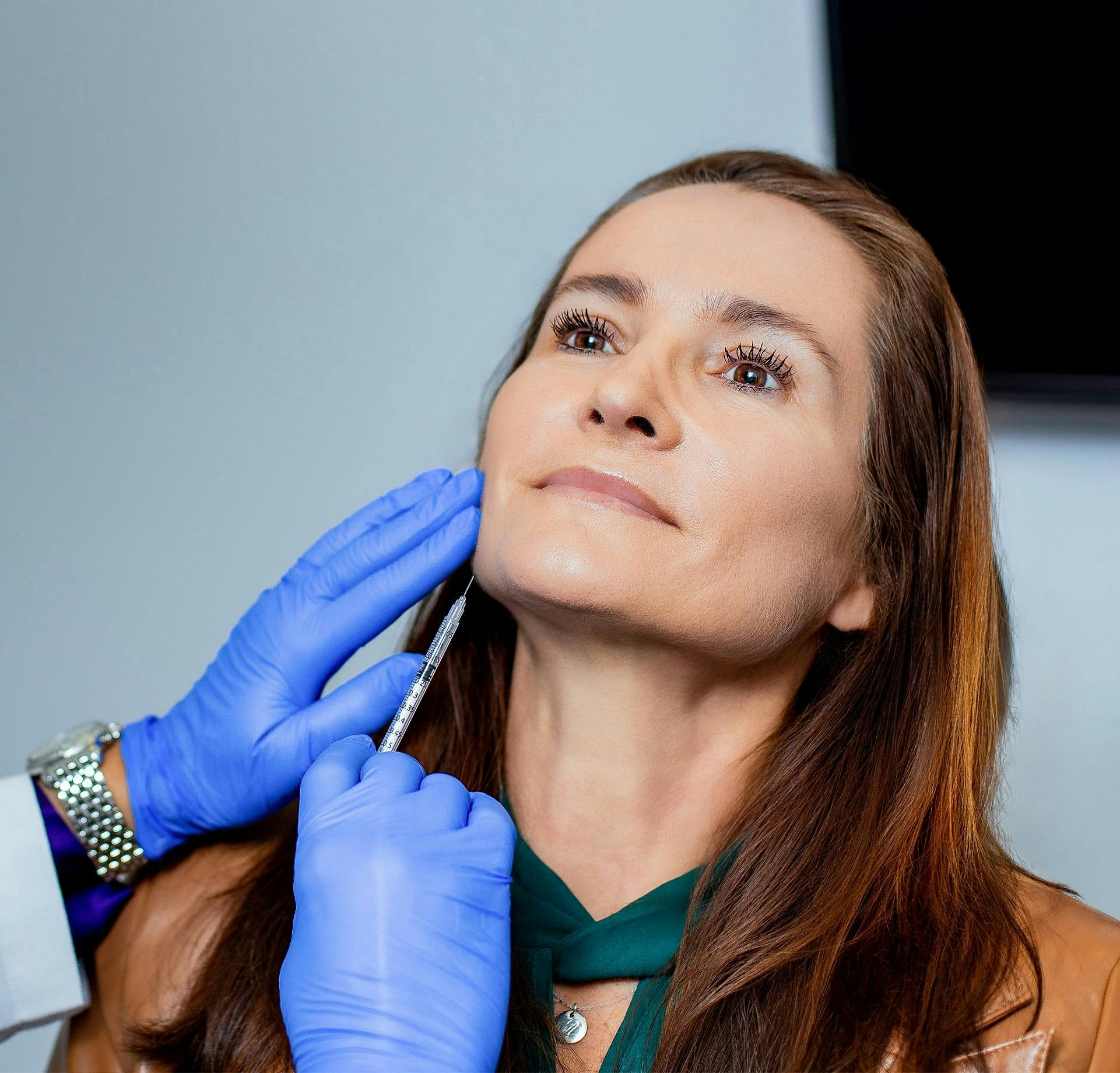 Woman during injectable treatment