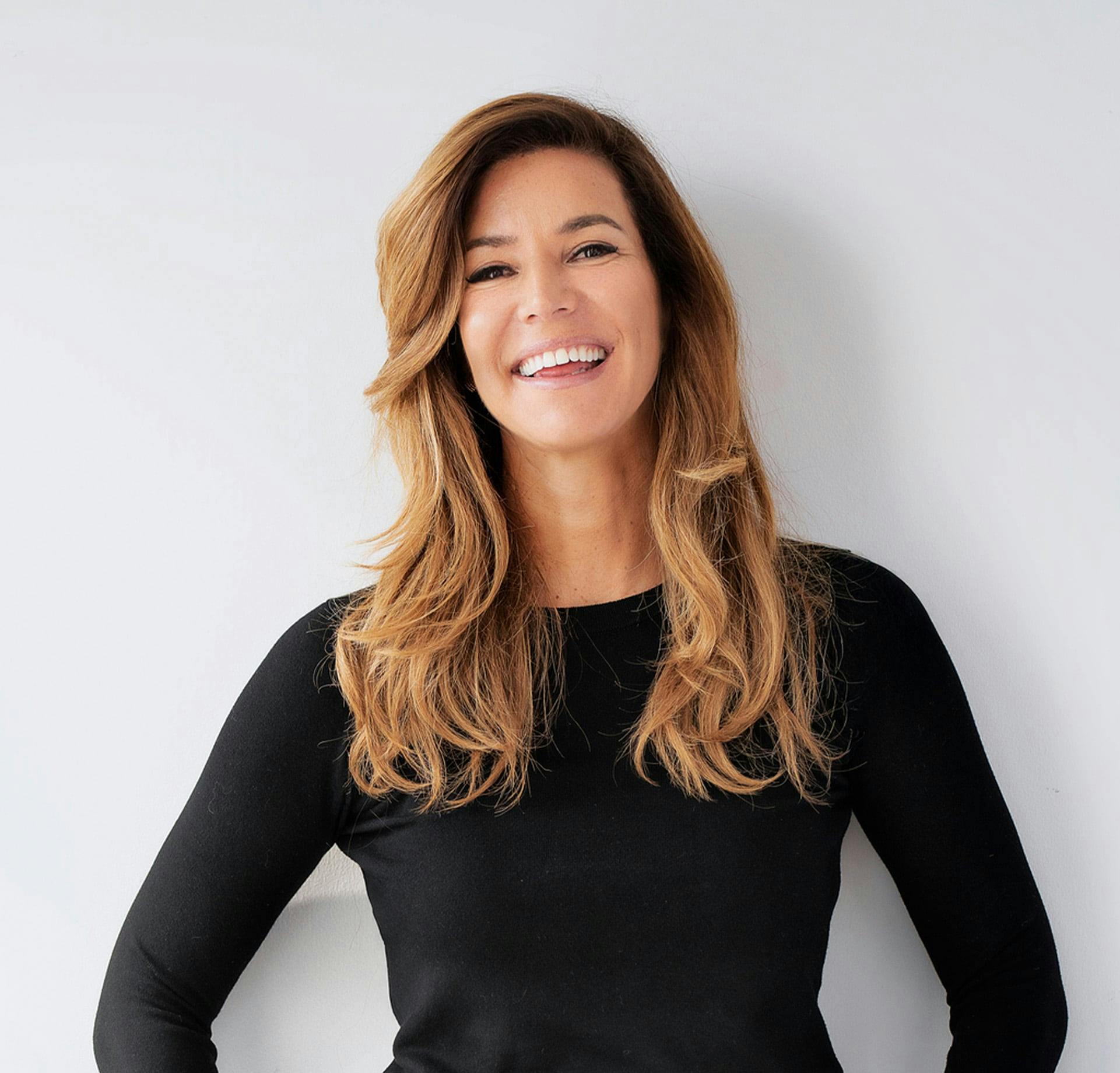 Woman in black shirt smiling