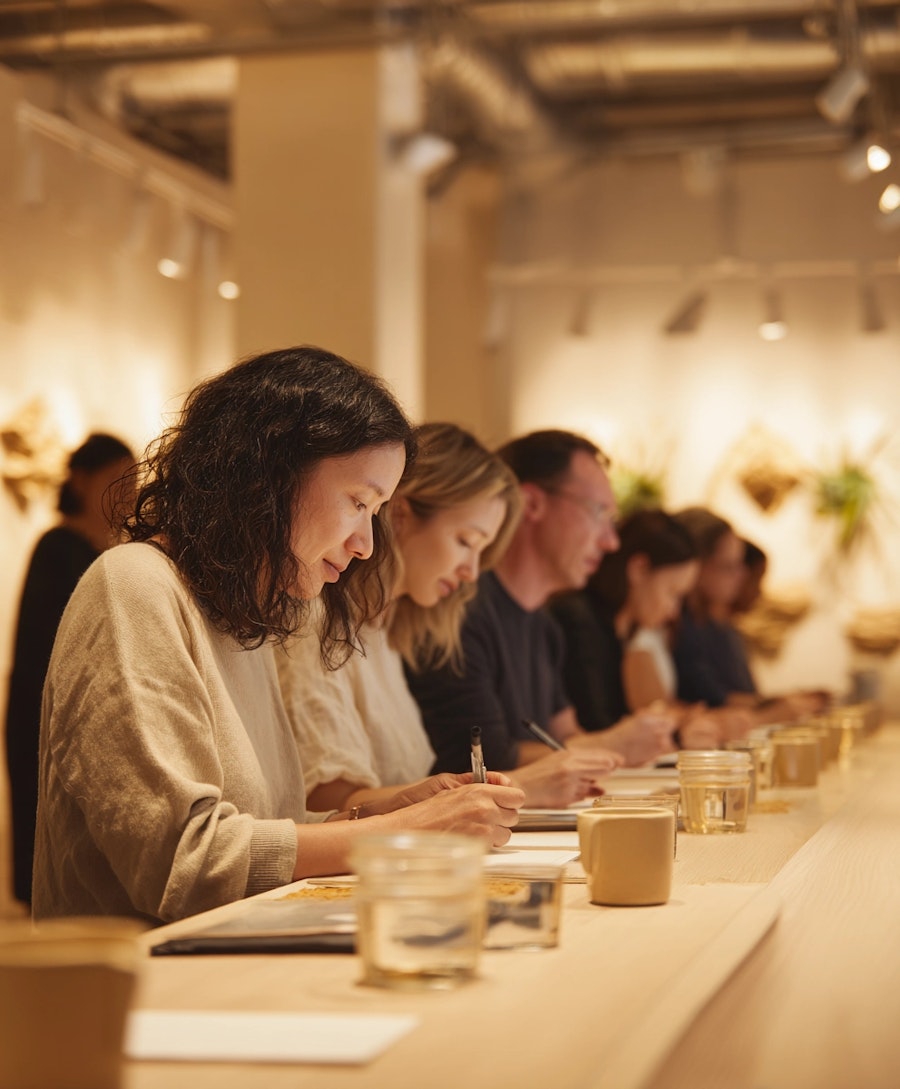 Consumers participating in a central location testing session, evaluating products in a controlled environment.