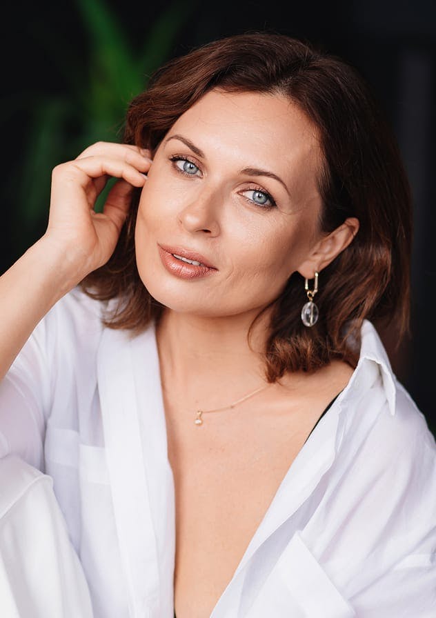 Smiling woman indoors used as category card for Hair treatments