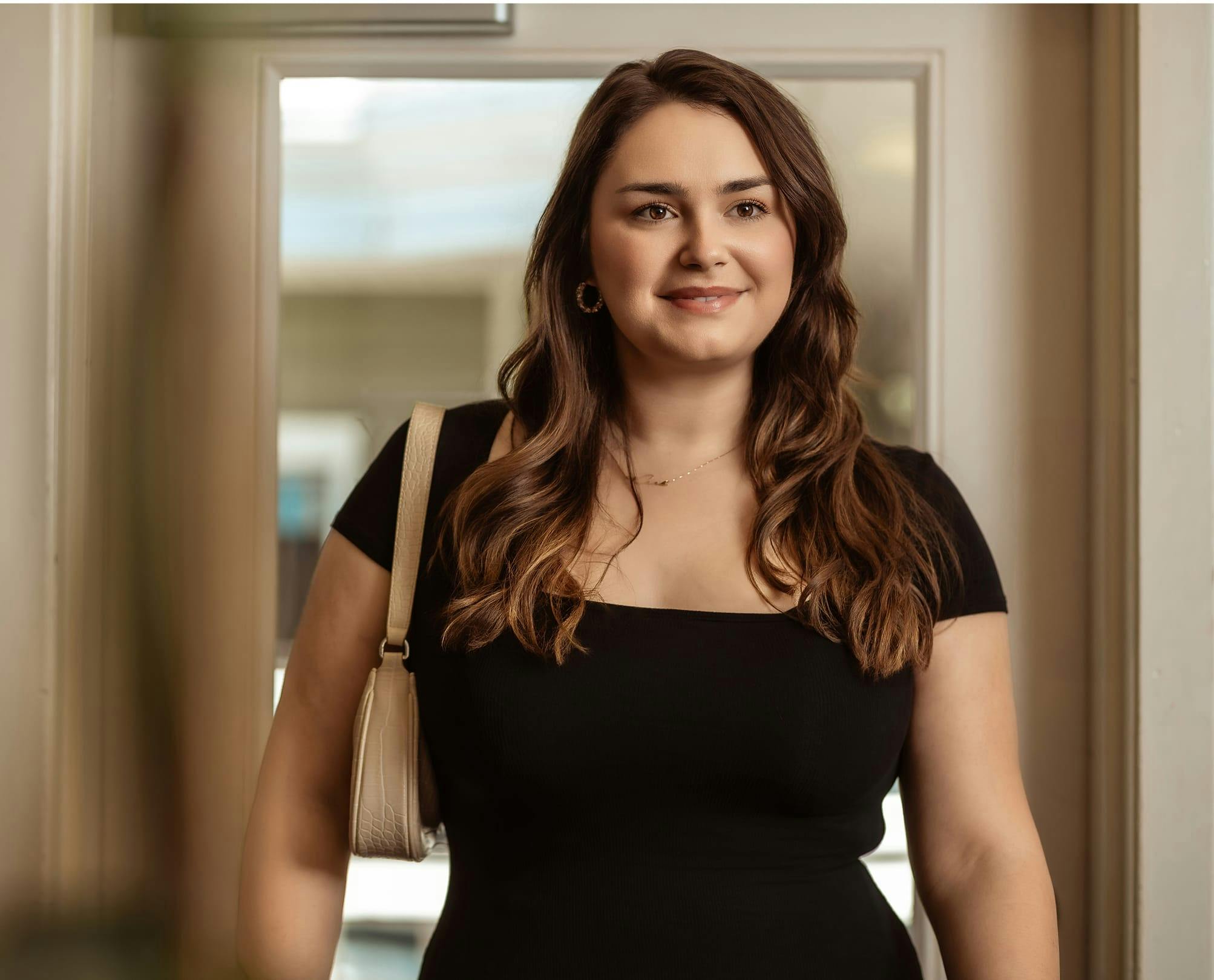 woman with wavy brown hair