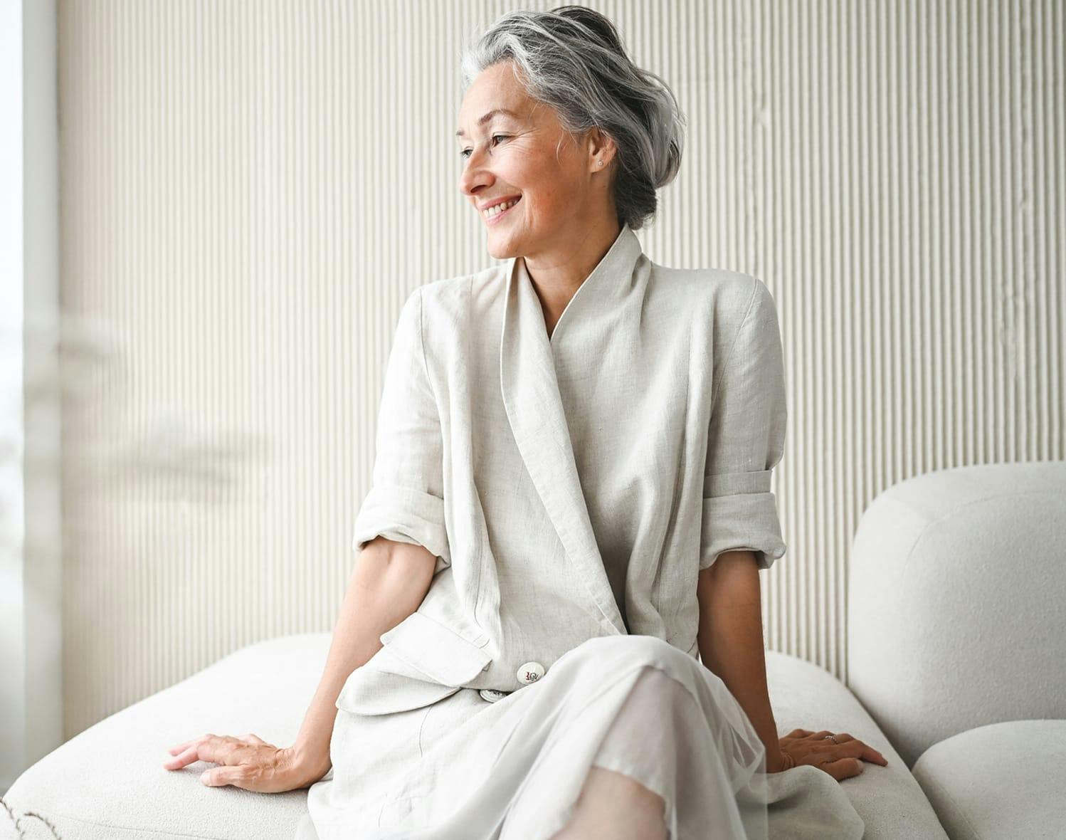 older woman sitting on a couch