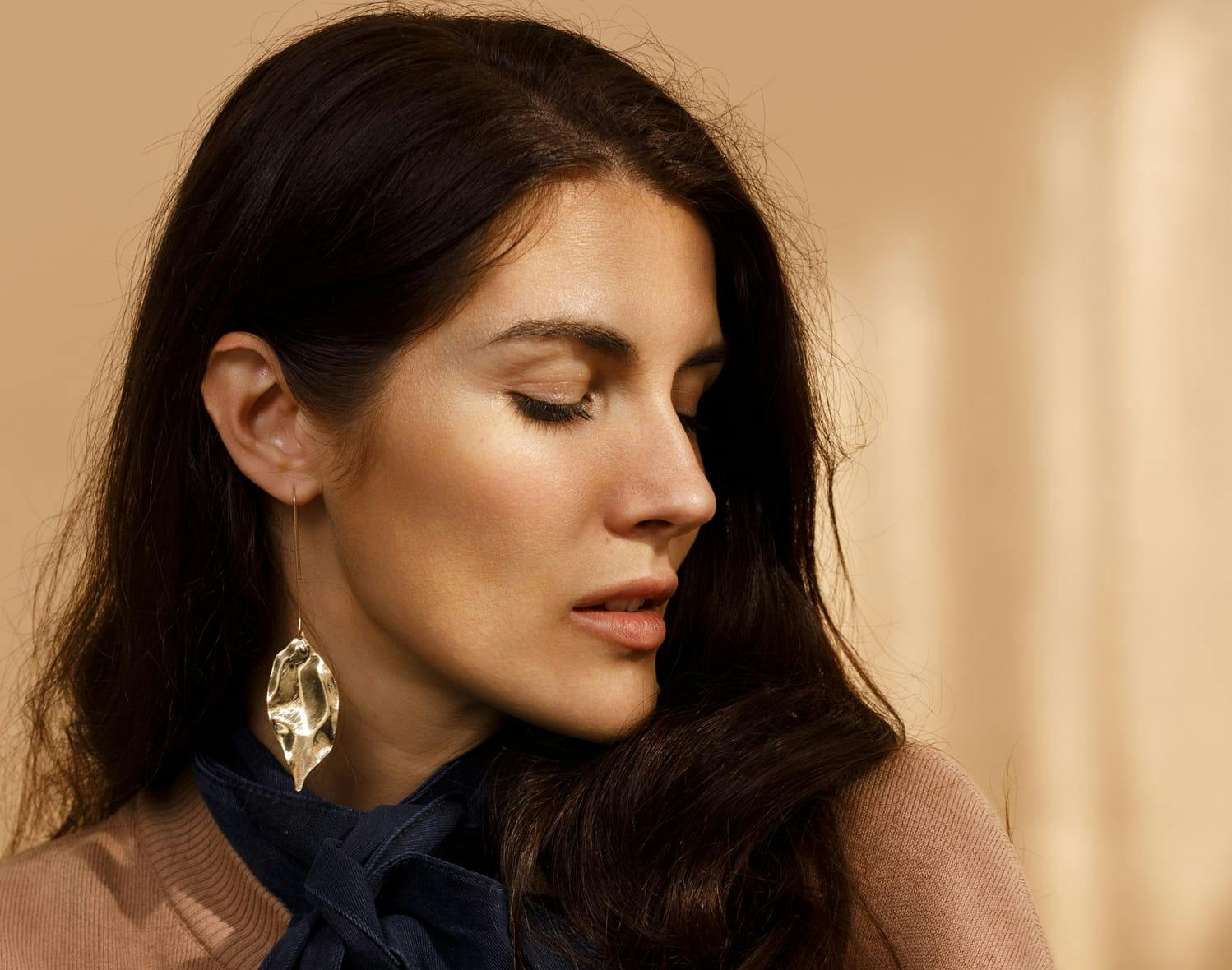 woman closing her eyes