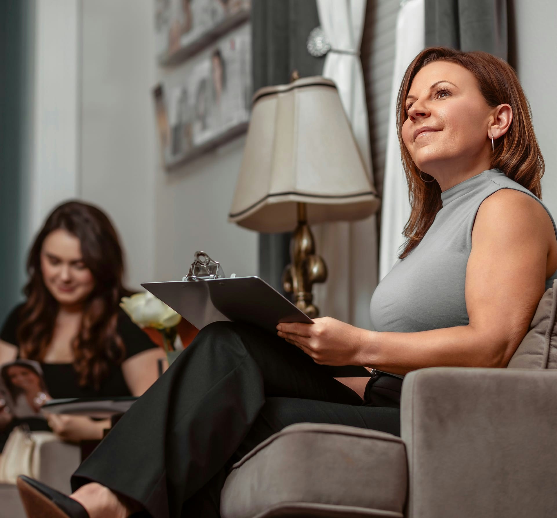 woman filling out paperwork