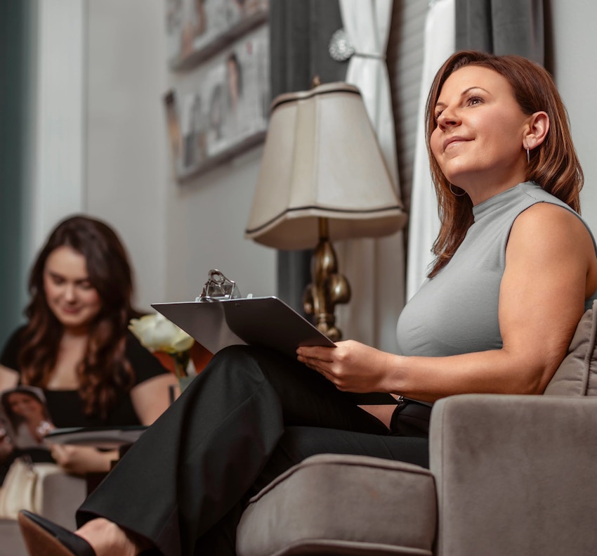 woman filling out paperwork
