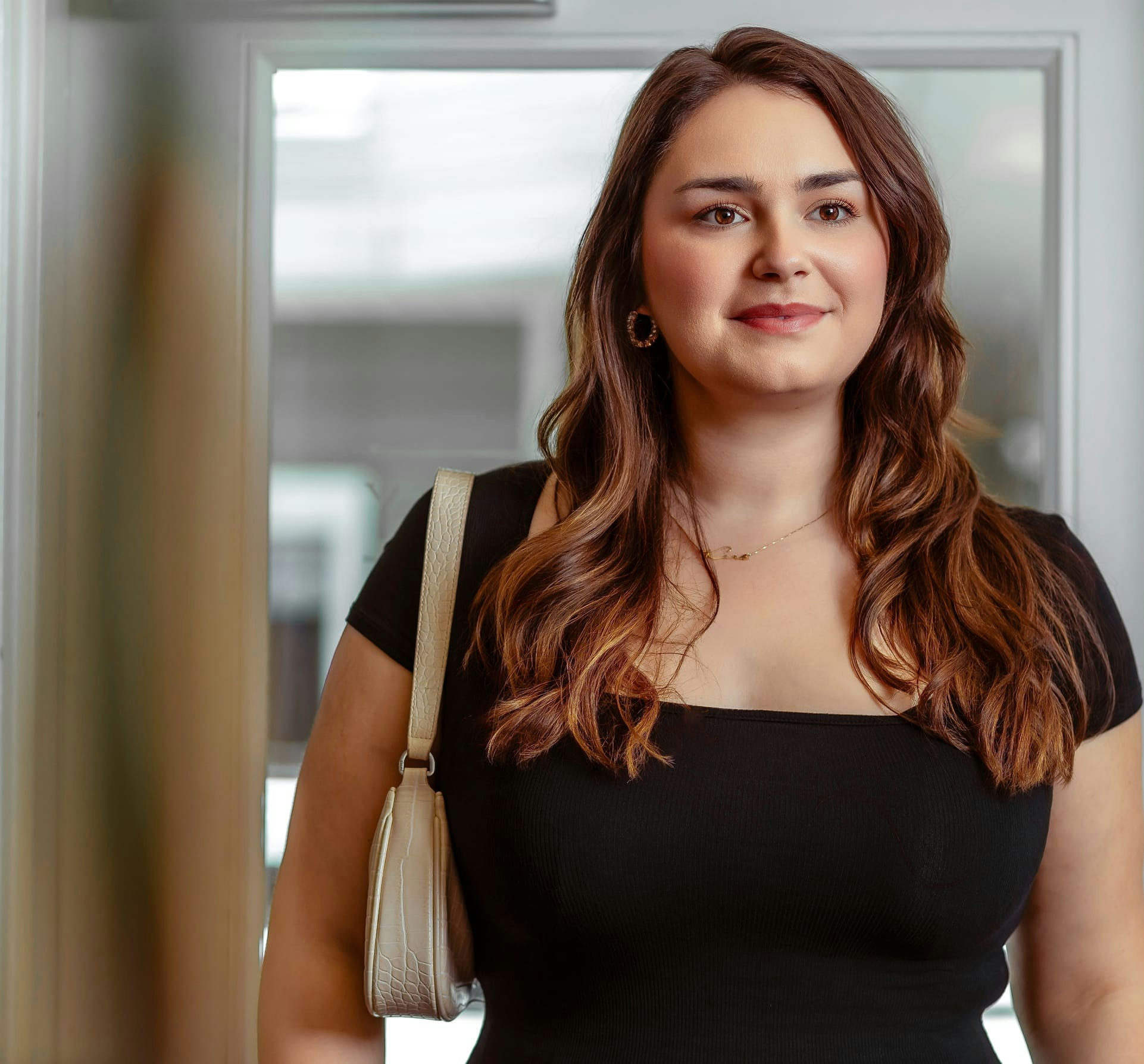 woman walking into the office