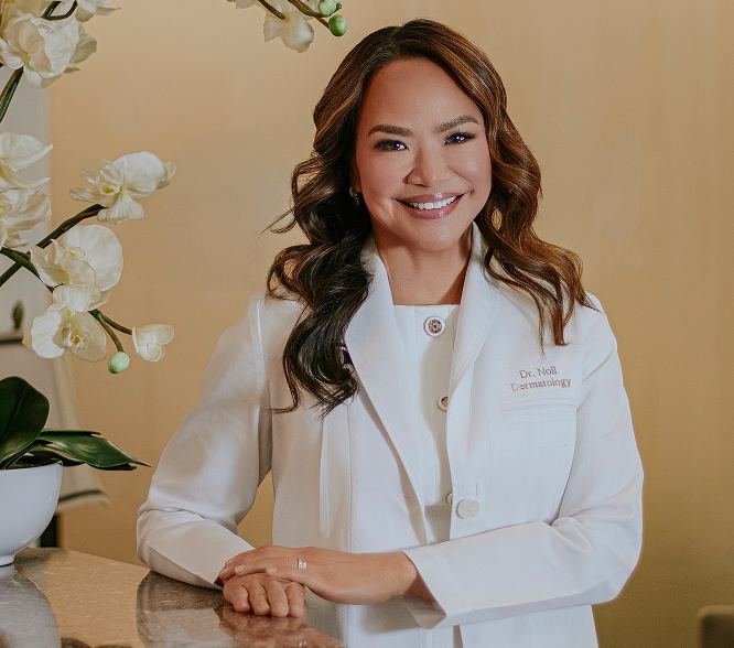 woman in a white button up top