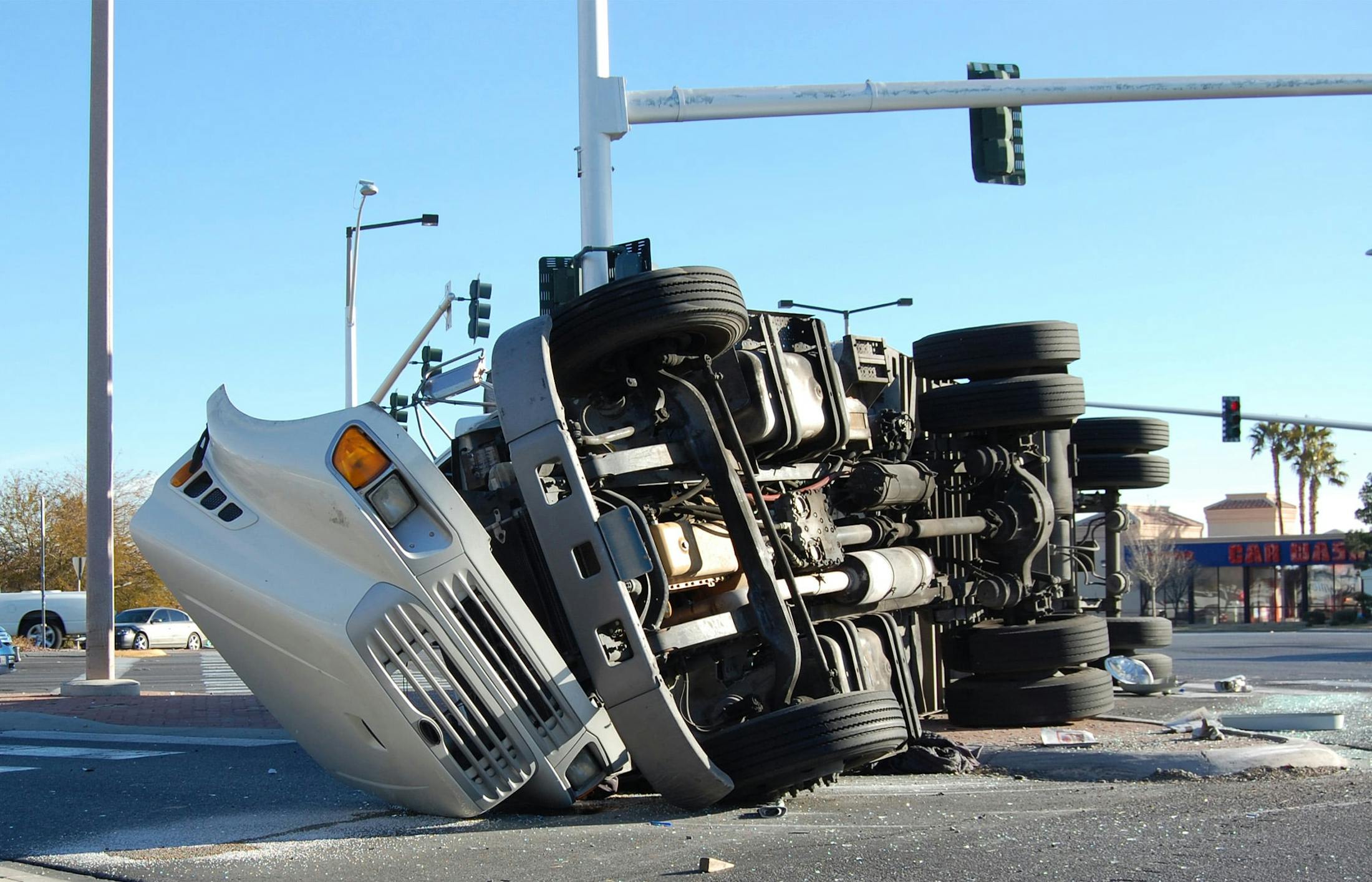 Semi truck on its side