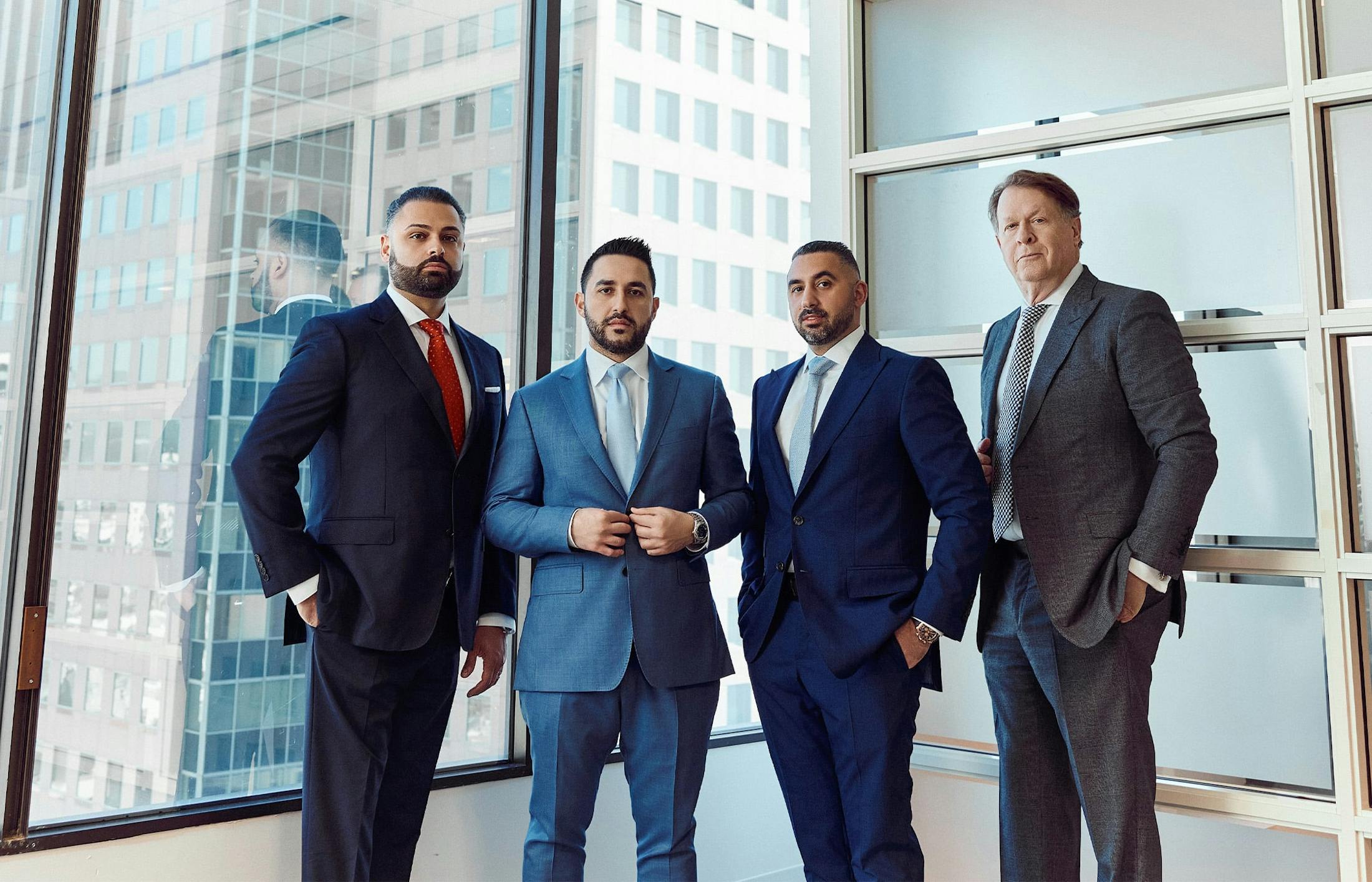 Four attorneys in suits