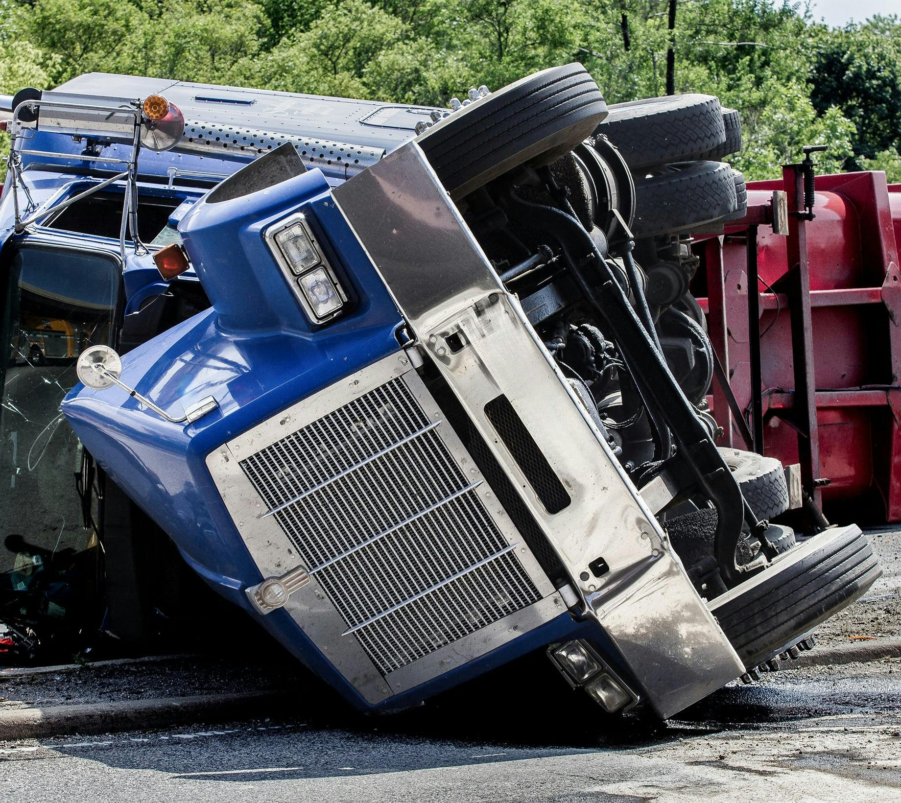 Semi truck on its side