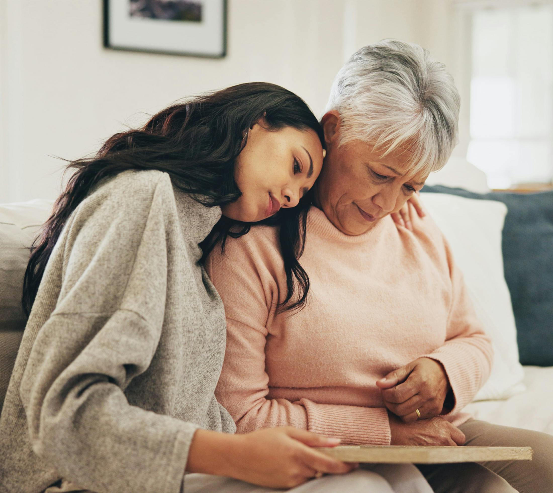 Woman comforting another woman