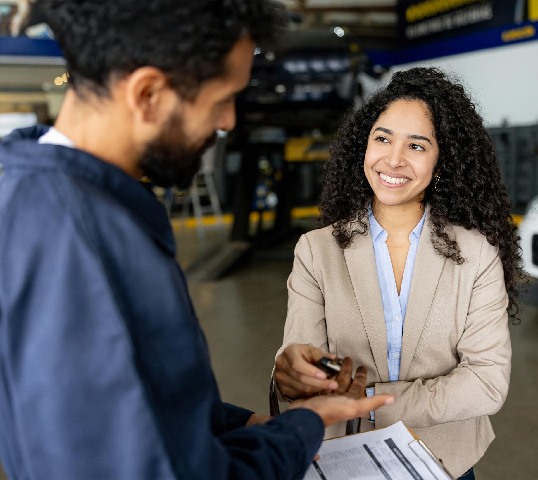 A woman buying a car