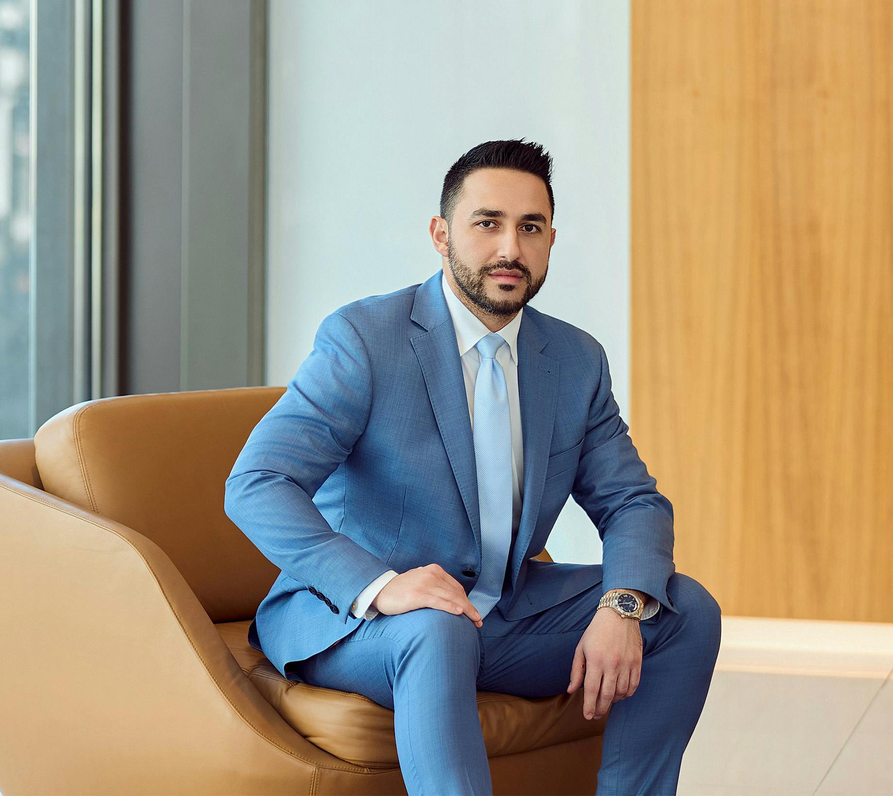 Jonathan Shirian sitting on chair