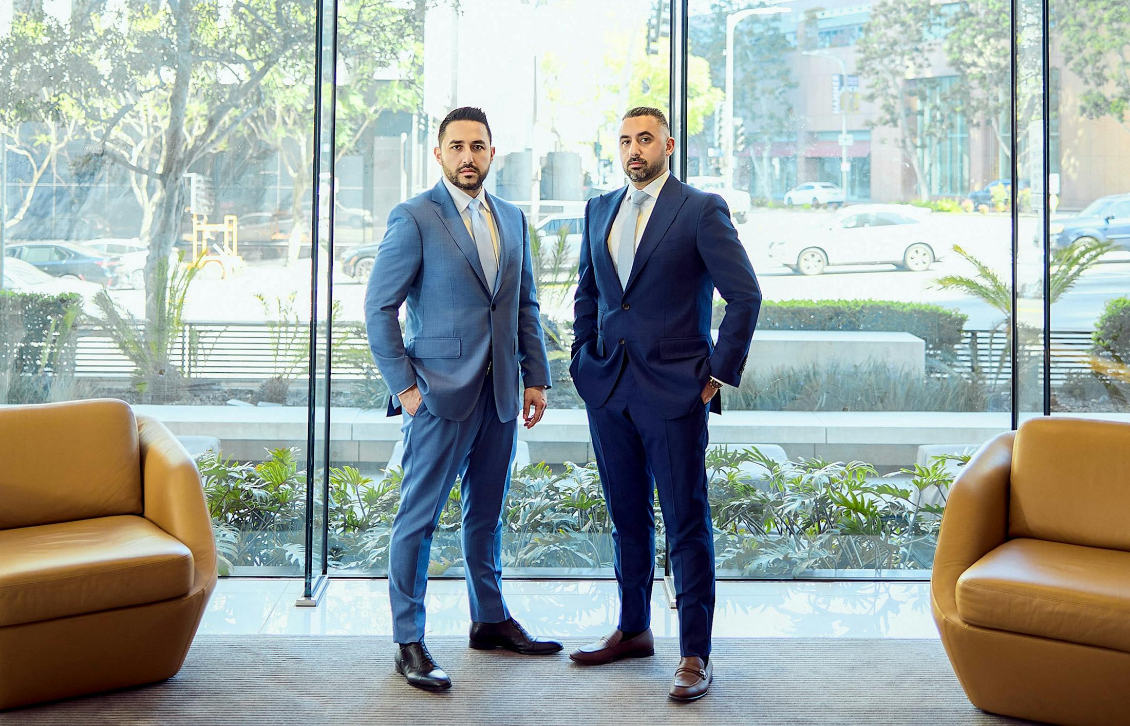 Kevin and Jonathan standing in front of window