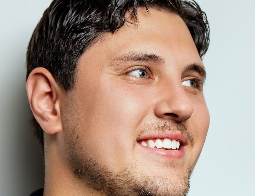 close up on man smiling