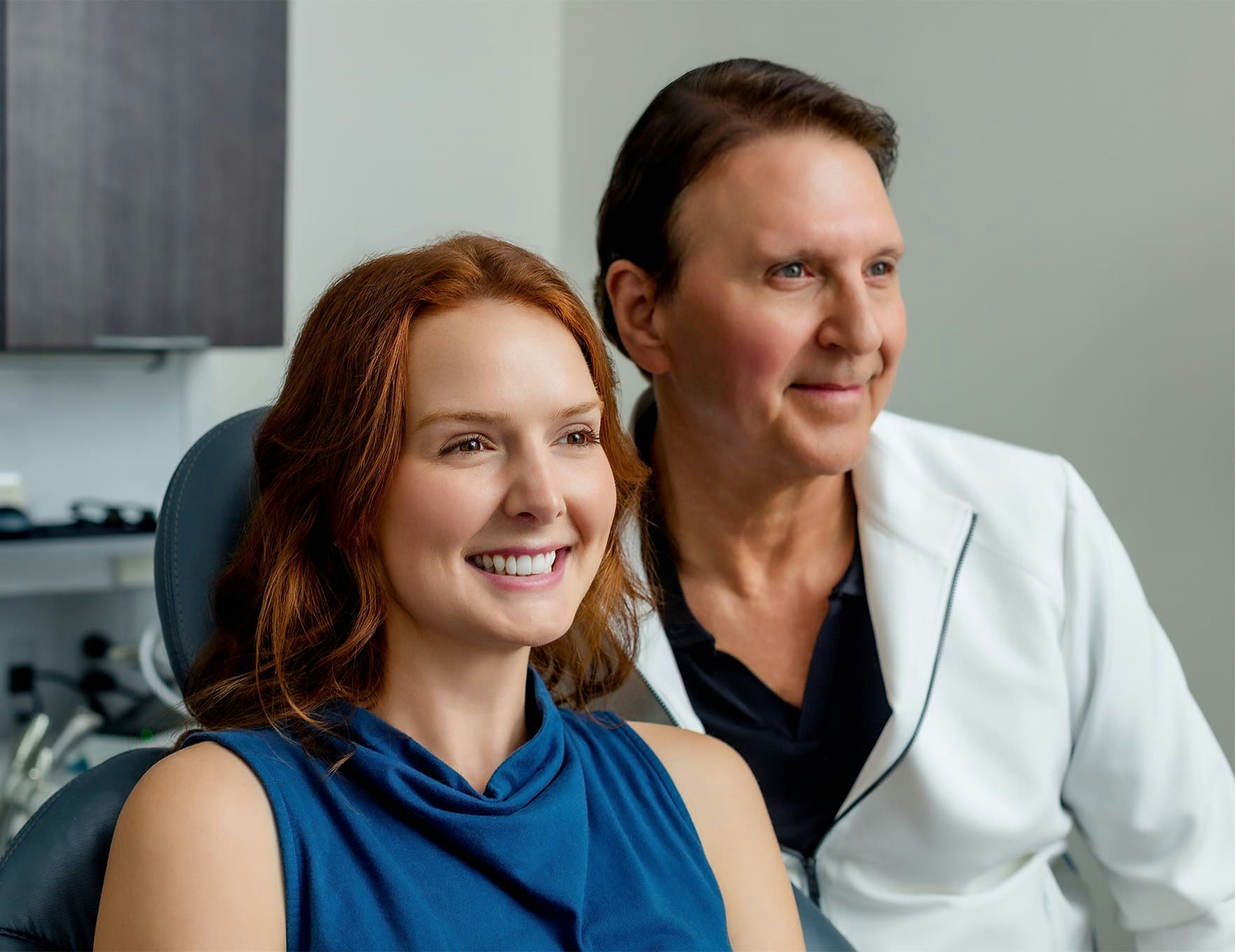 John Rink with female patient both smiling