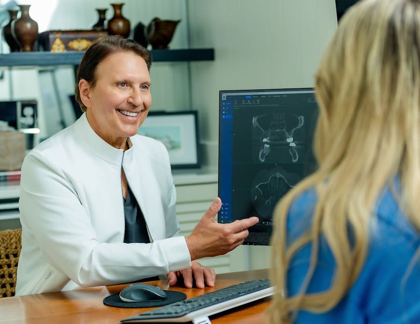 John Rink showing patient her x-rays
