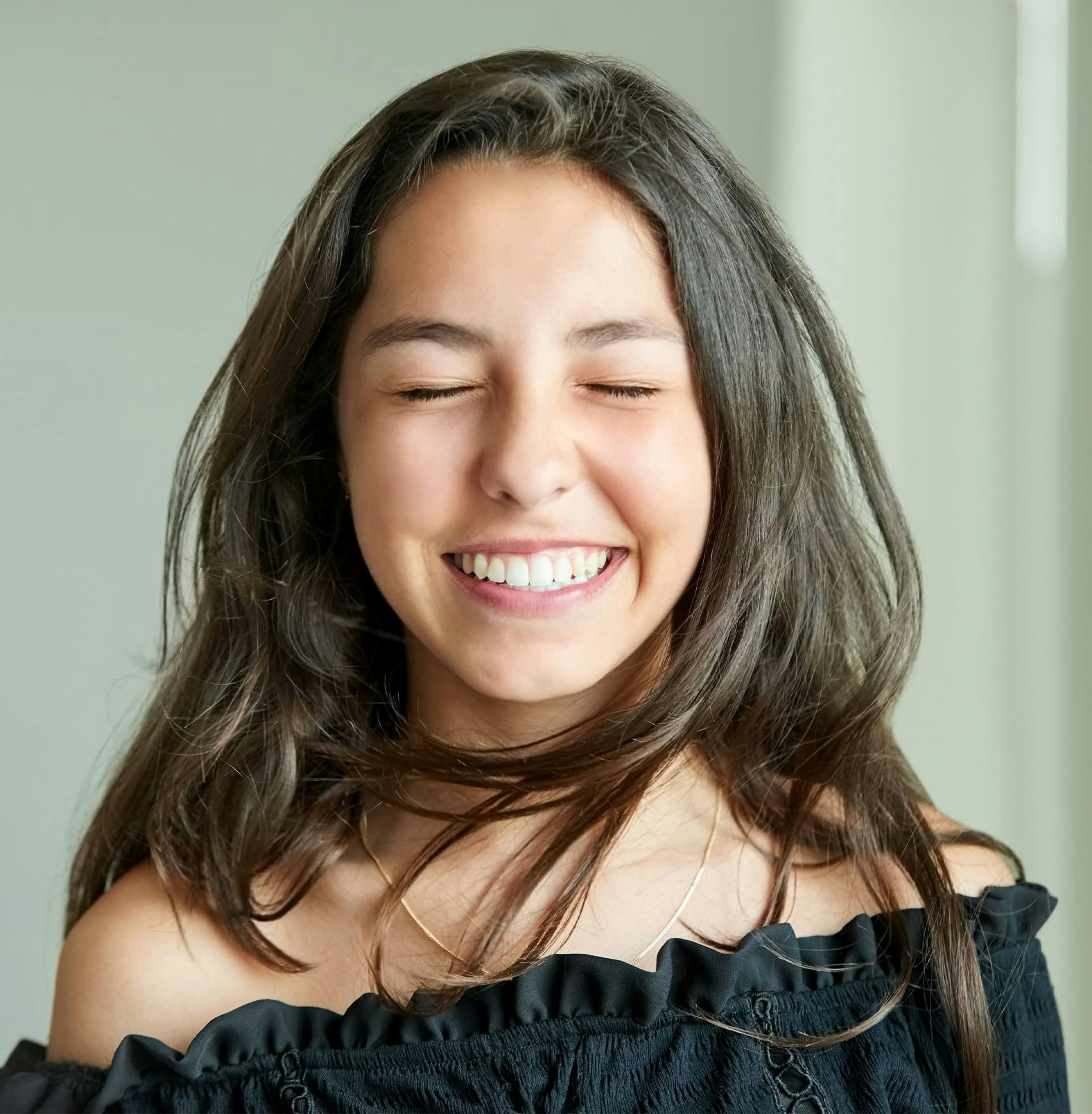 teenage girl smiling