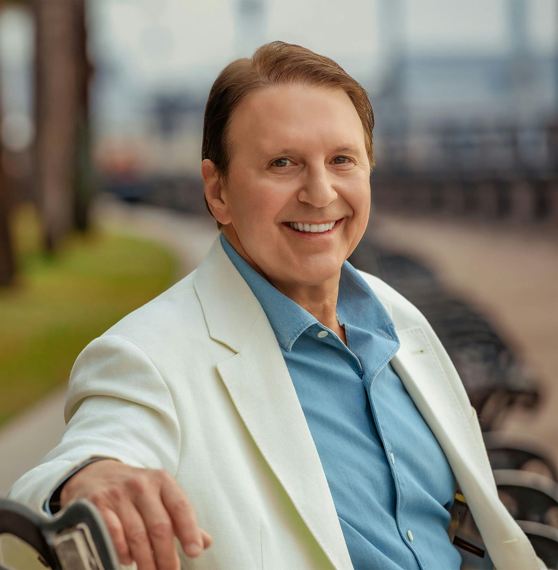 John Rick sitting on bench