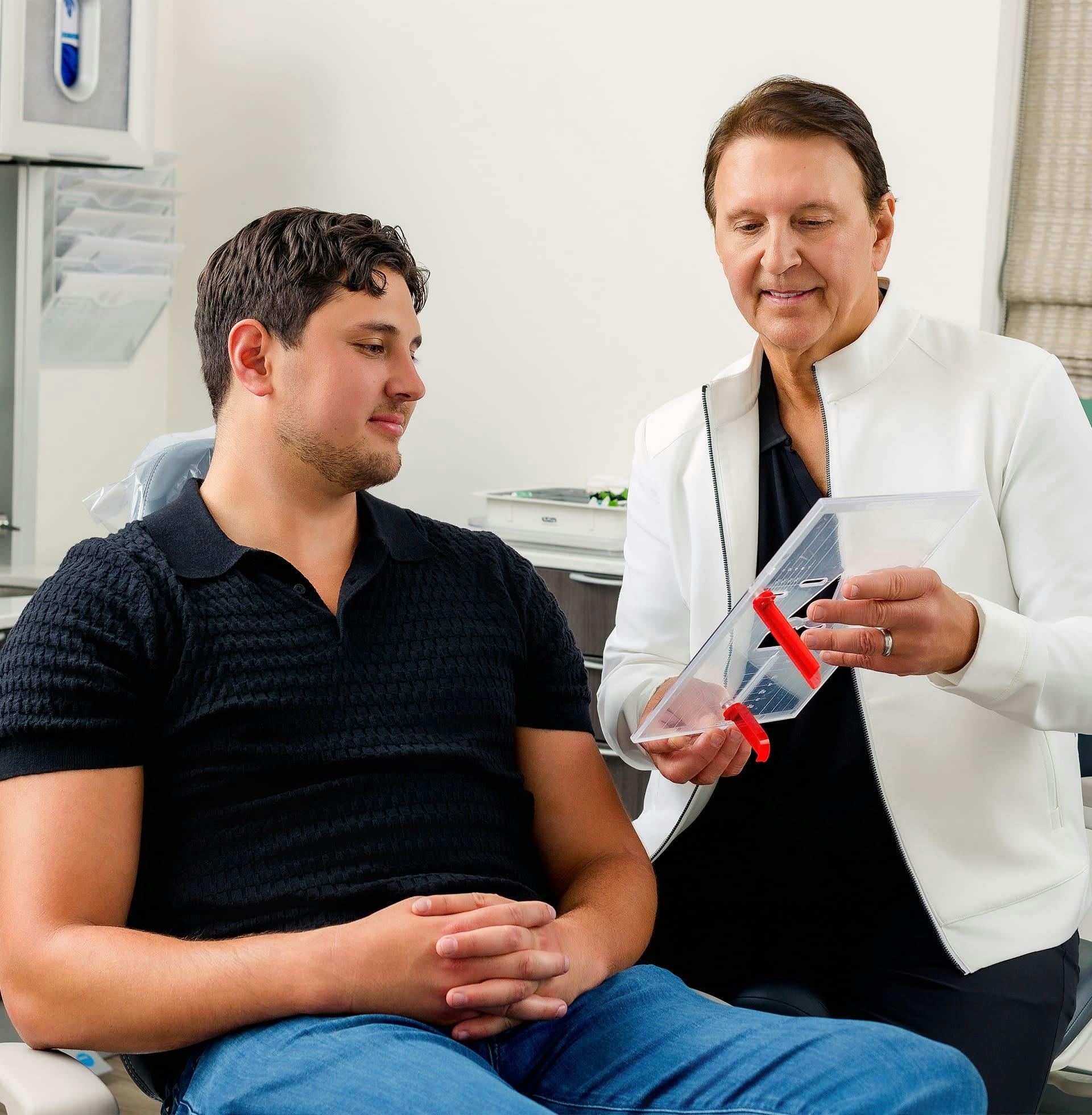 John Rink with male patient