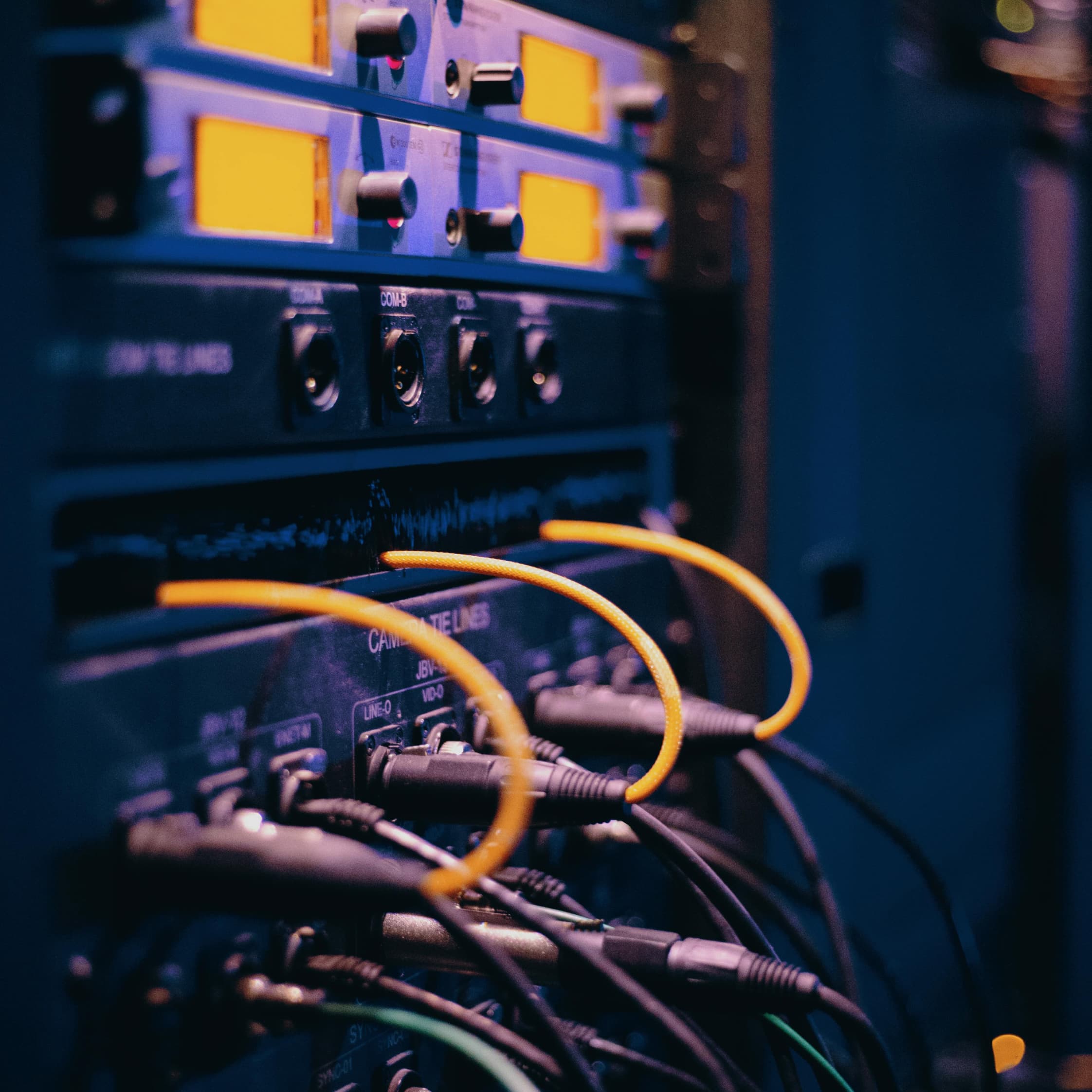 Server infrastructure with yellow network cables in a modern data center for secure data transfer
