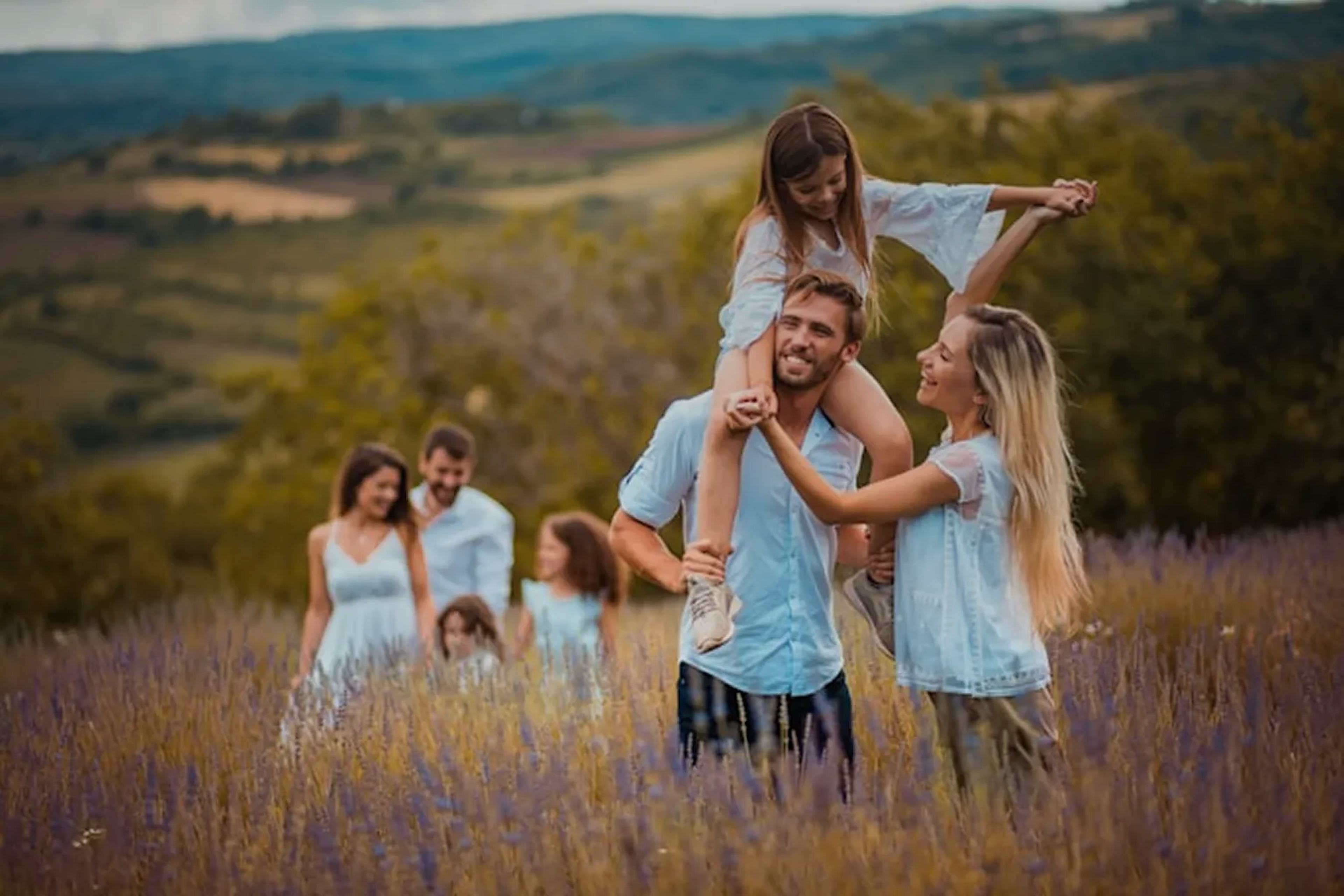 Photo of a family walking in a lavender field.