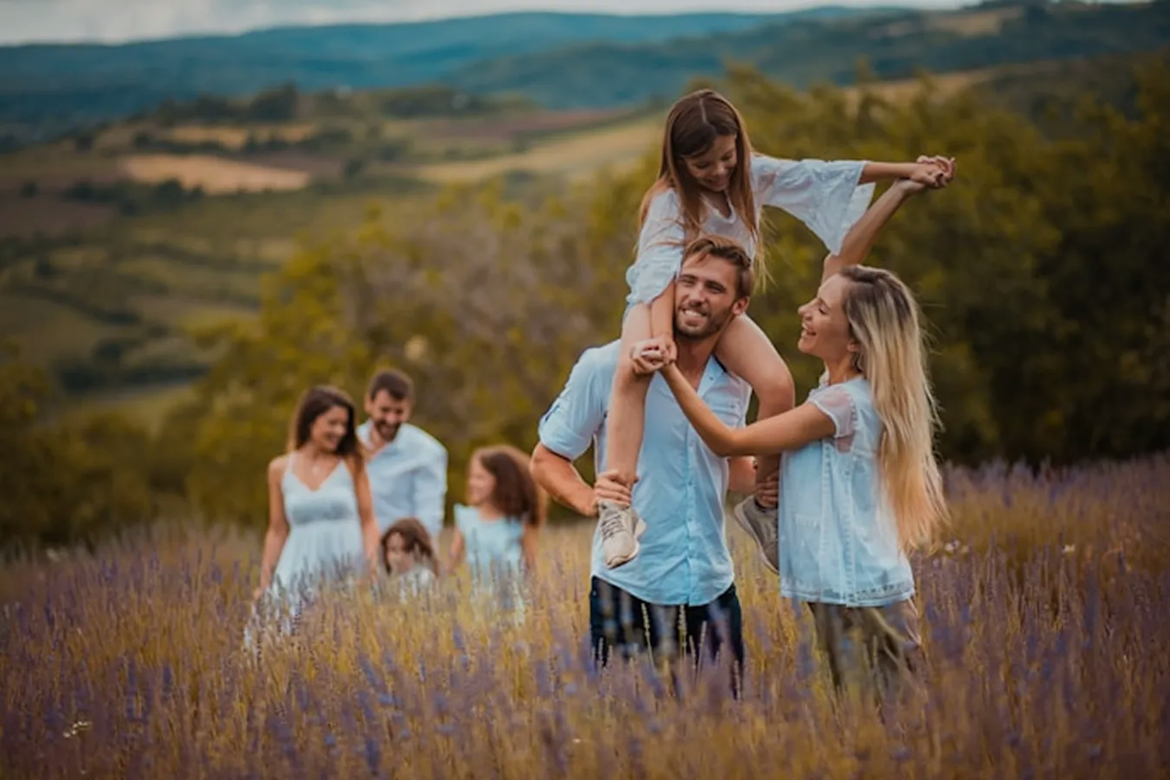 Photo of a family walking in a lavender field.