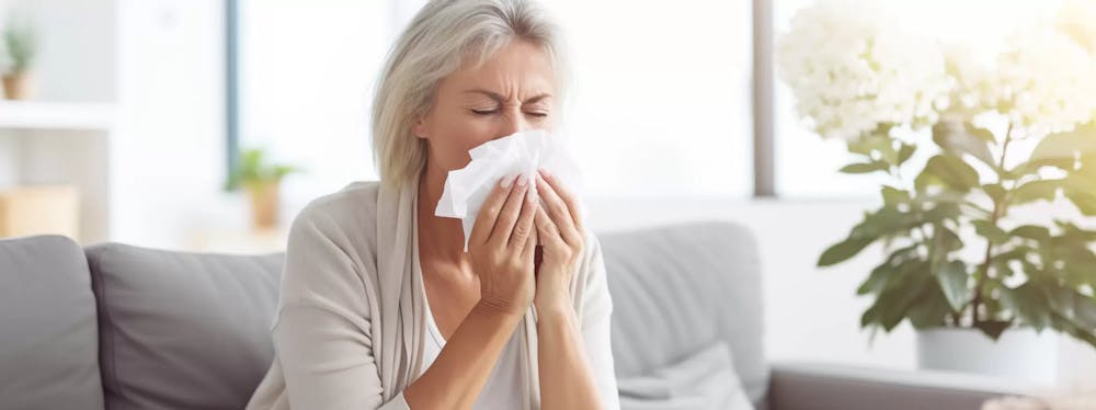 woman sneezing
