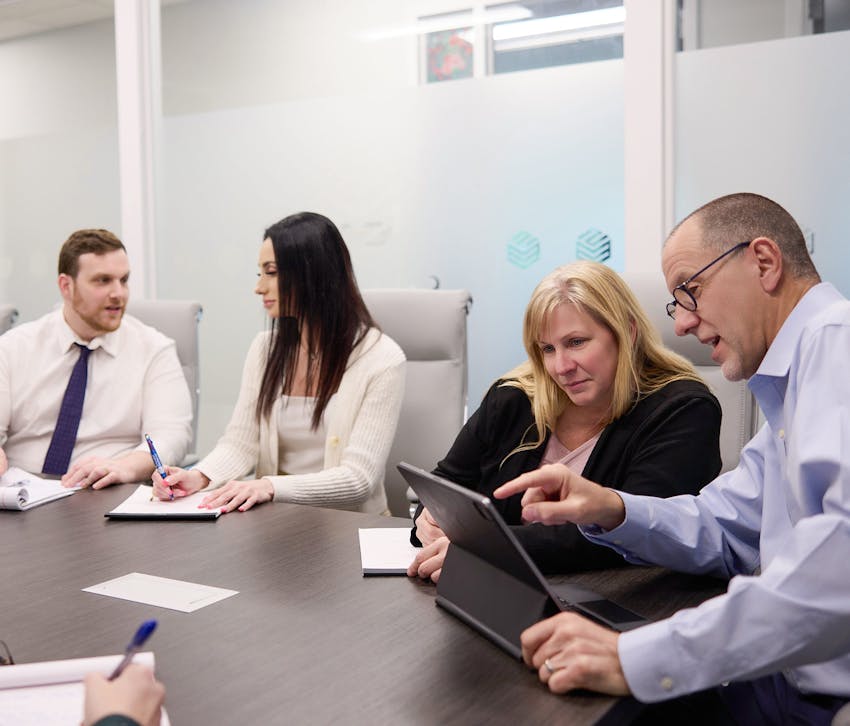 group of people in a meeting