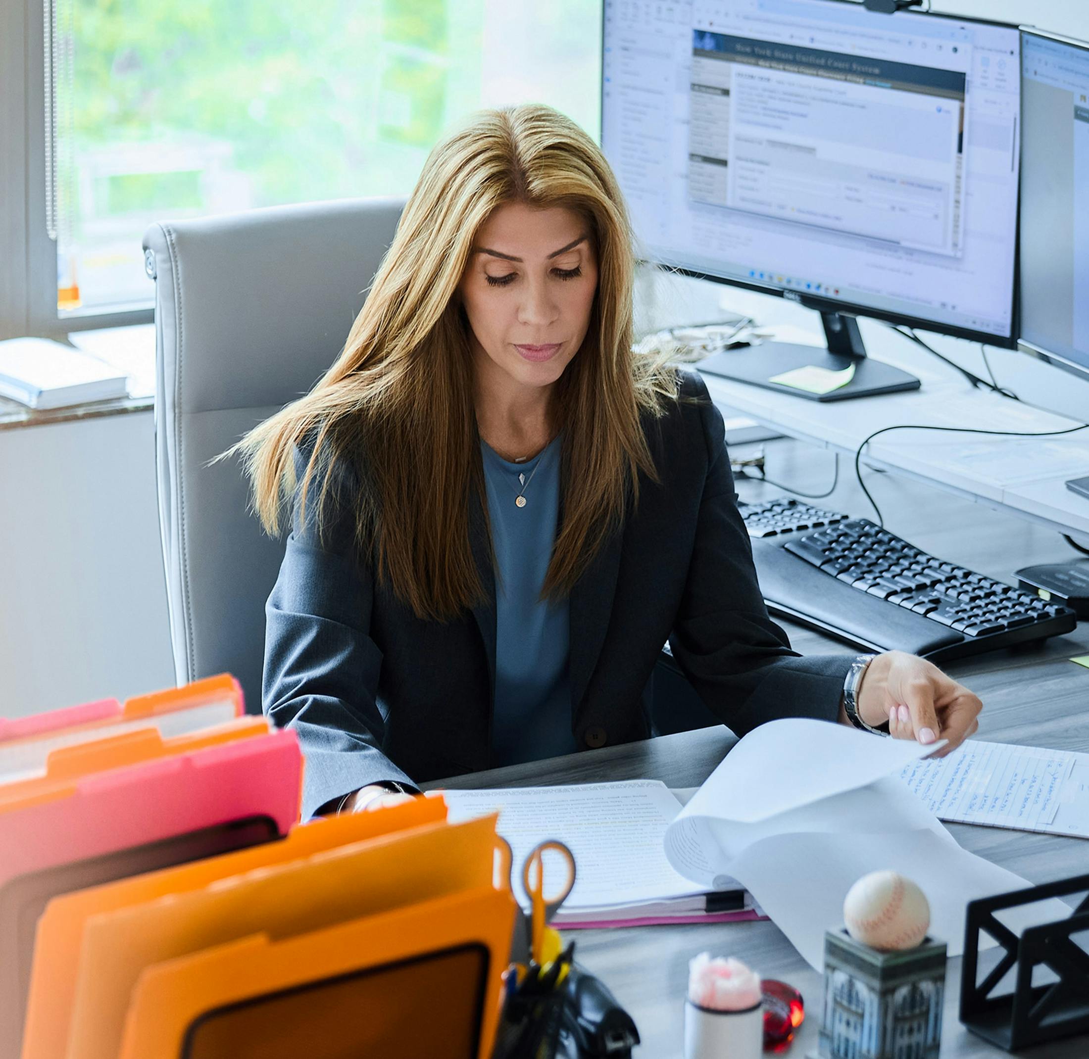 woman looking at paperwork