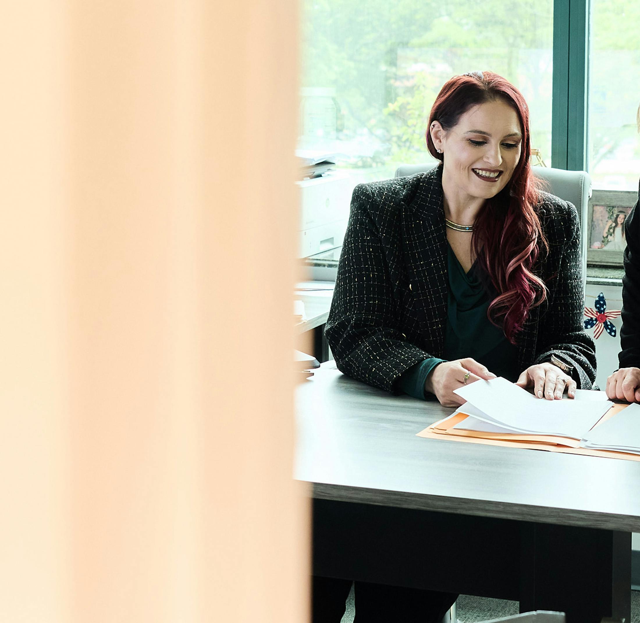 attorney holding a folder