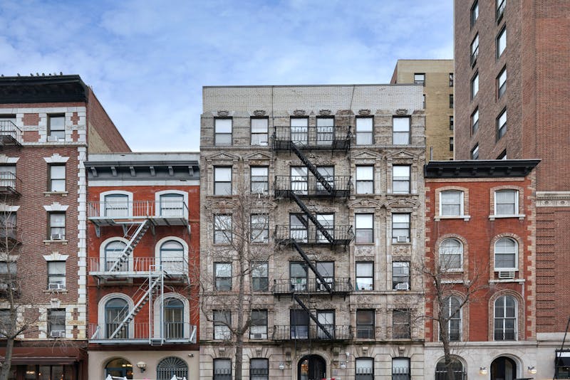 New York City old fashioned apartment buildings with external fire ladders