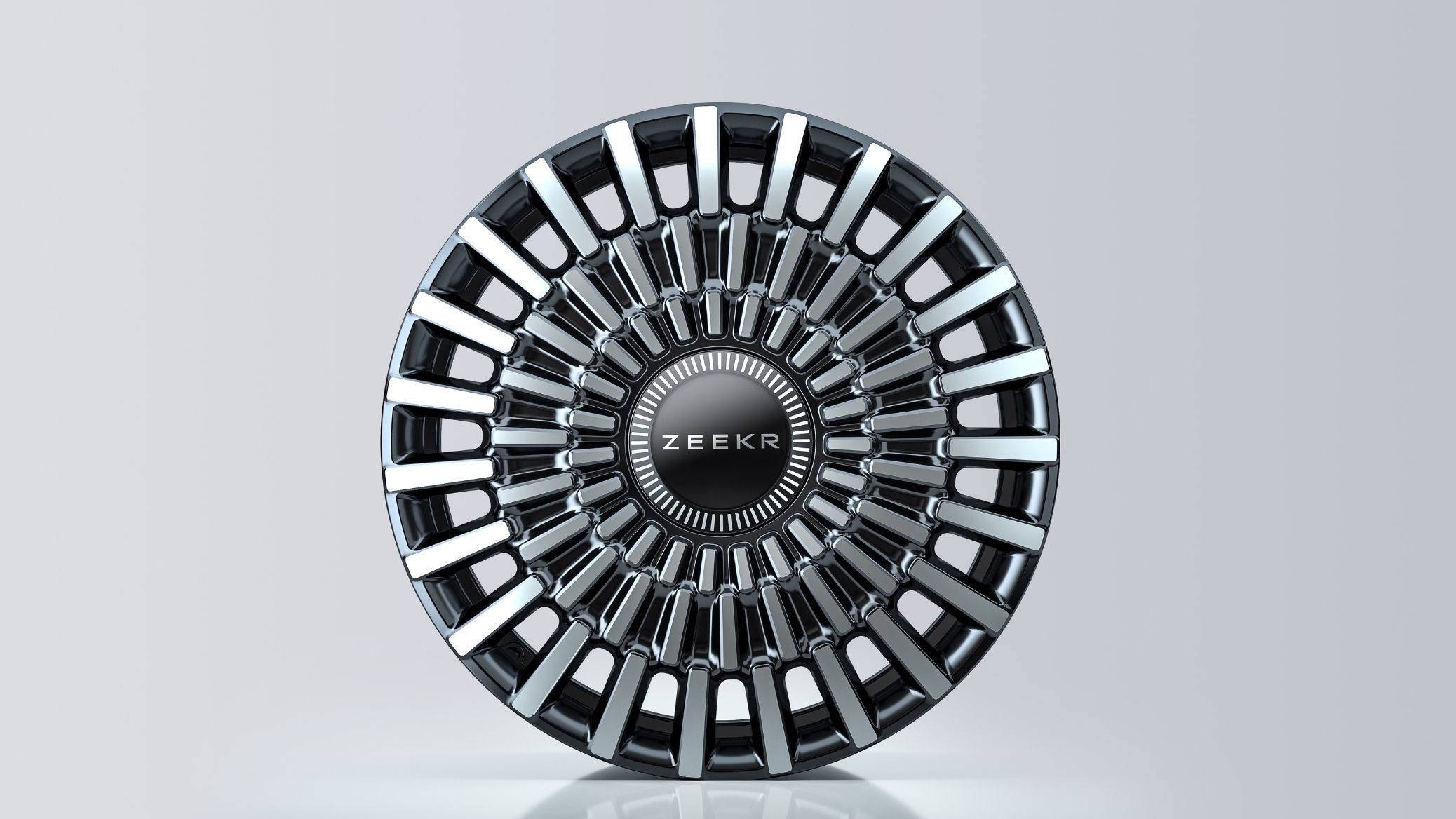 Close-up view of the Zeekr 009’s 20-inch aero-style alloy wheel featuring the Starlight pattern and MICHELIN Pilot Sport EV tyres.