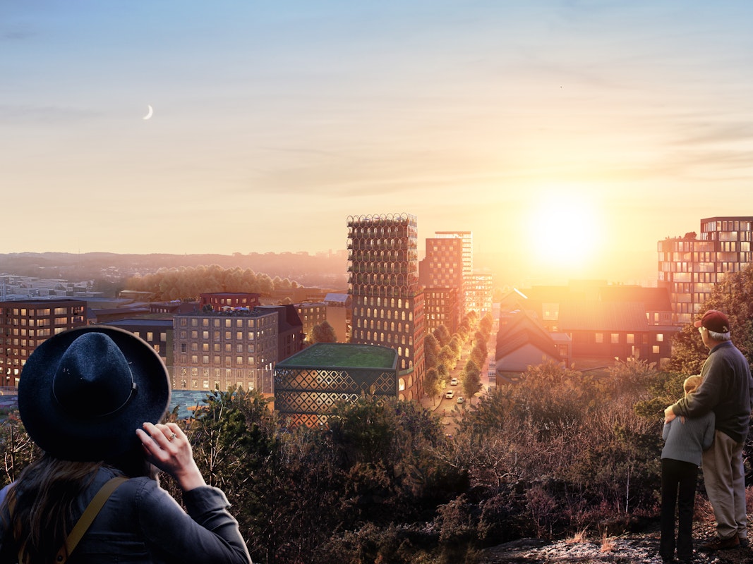 Södra Änggården Visionsbild i skymning. Vy från Änggårdsbergen ned mot bostadsområdena.