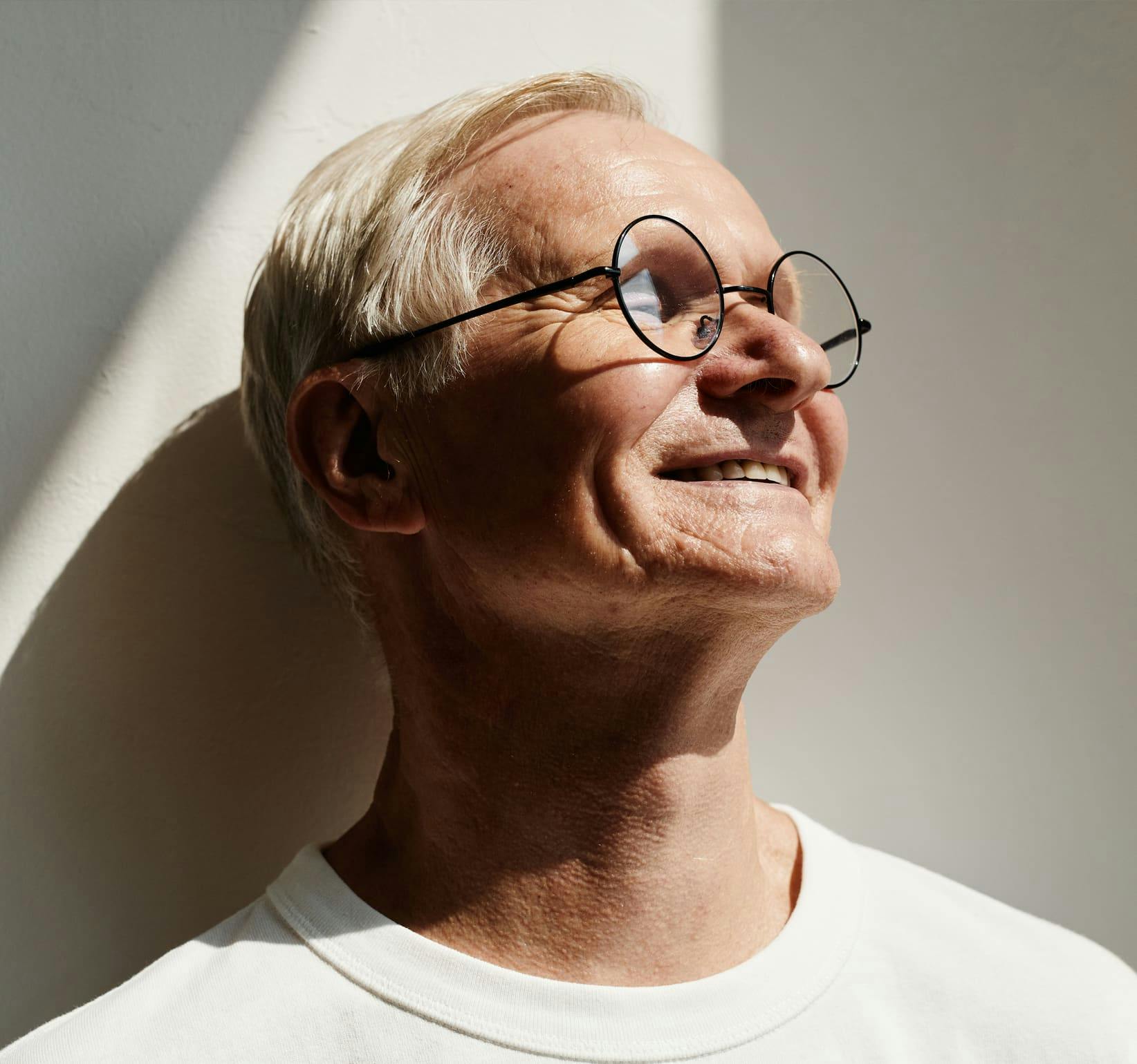 older man with glasses