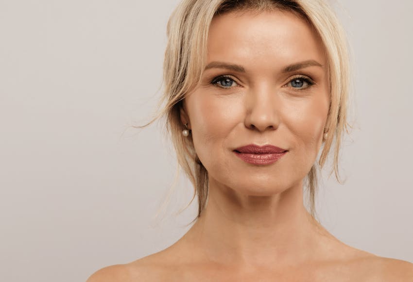 blonde woman looking forward