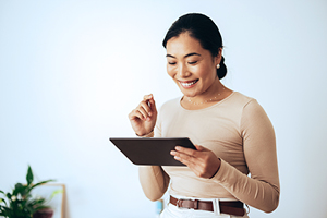 Woman reading article on tablet