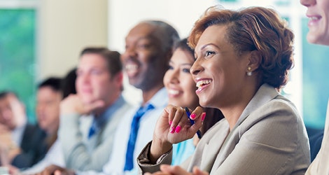 Adults listening to a seminar