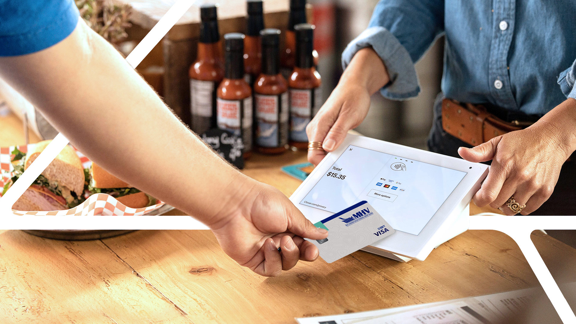 Person paying at small business using Clover