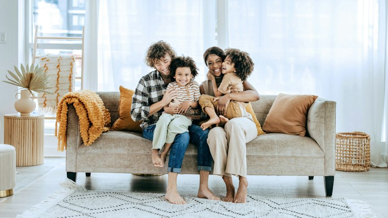 Family sitting on couch