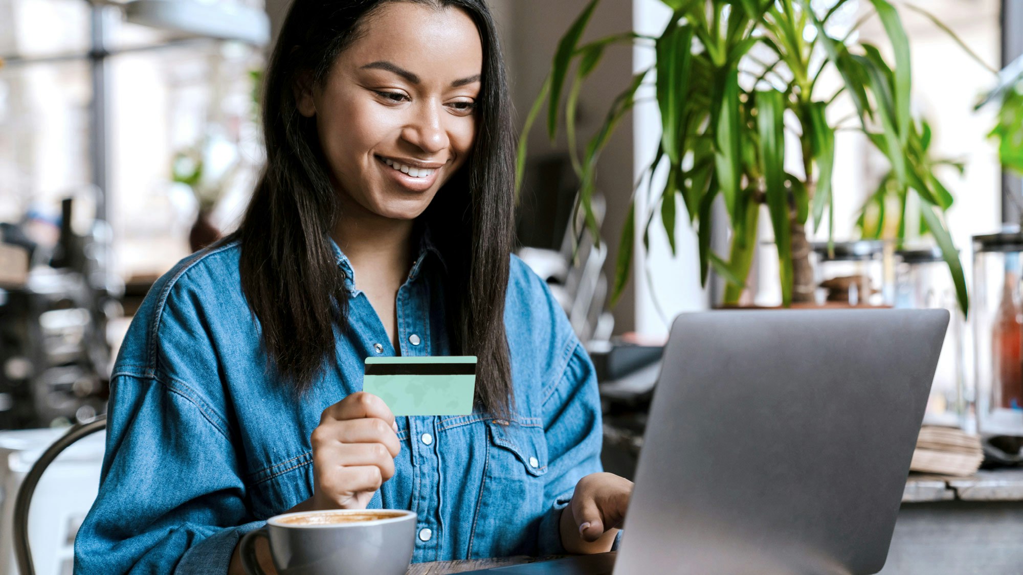 Woman holding credit card