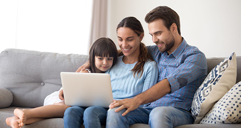 Family looking at computer
