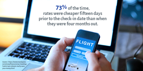 Person holding phone and searching for flights