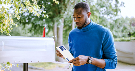 Man at mailbox