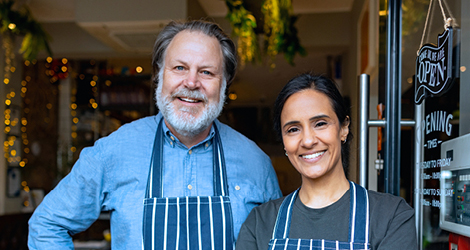 Smiling business owners