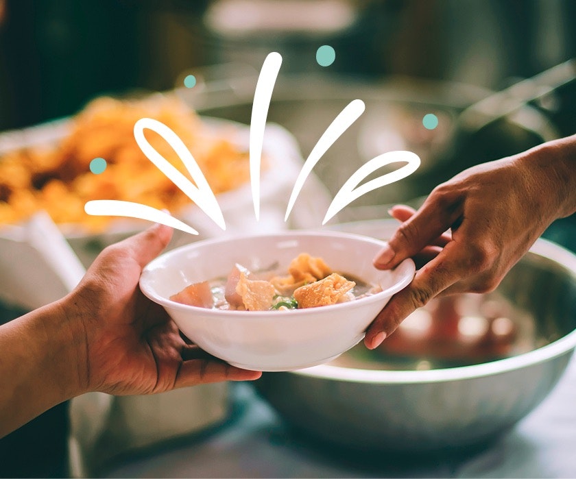 Offering a bowl of food