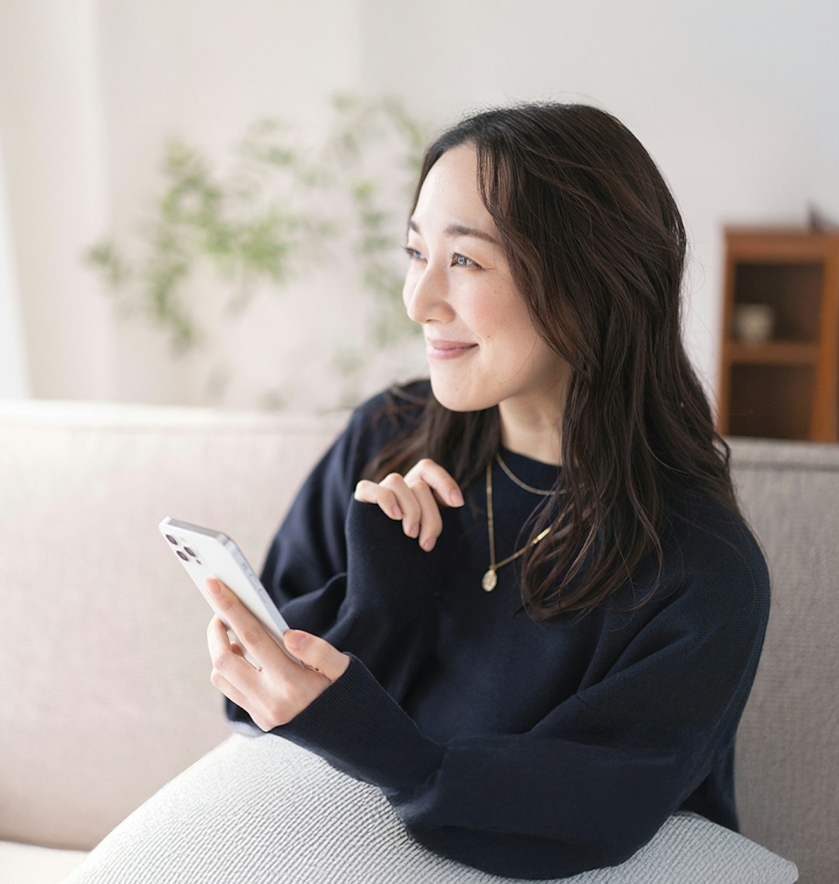 Woman holding a mobile phone